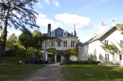 Maison l'Amerique Welcome You to One of Their Rooms. Dogs Are Also Welcomed Hotels in 