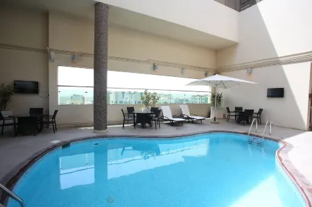 Ramada by Wyndham Abu Dhabi Downtown Отели в г. Абу-Даби