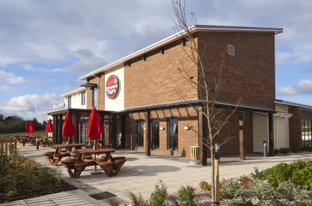 Premier Inn Exeter (M5 J29) Отели в г. Топшем