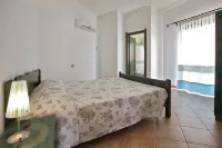 Club Esse Residence Capo d'Orso فنادق في بالاو