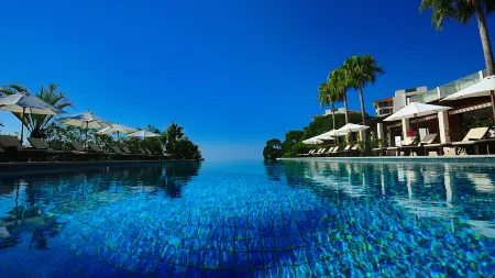 The Atta Terrace Club Towers Отели рядом с достопримечательностью «National Institute of Information and Communications Technology Okinawa Electromagnetic Wave Technol»