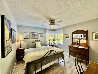 Waterfront Resort Style Oasis ~ 2 Acres, Heated SW Pool, Fire Pit, Outdoor Games Hotels near Orthopedic Center of Palm Beach County