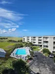 Cozy condo located one block from Carolina Beach and Freeman Park.