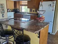 Sunland Cottage in 55+ Golf Community