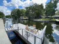 Waterfront Paradise w dock, large patio, lanai, pool, hot tub! Bring your boat!