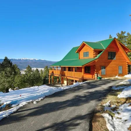 Incredible Views! Stunning log home w/ wrap around deck and covered porch
