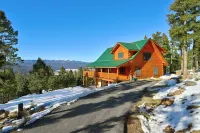 Incredible Views! Stunning log home w/ wrap around deck and covered porch