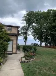 Historic cobblestone home both upstairs Apts on Lake Erie beach , WiFi sleeps 10