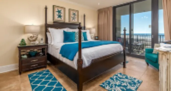 Top Floor with Penthouse Views! Beachfront- 2 Bdrm-2 Bath, 2 Pools and Hot Tub!