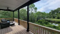 New modern home, 3 minute walk to the beach, on bike trail, full RV hookup