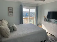 Tranquil beach getaway just steps from the sand!