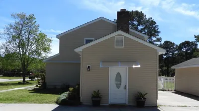 Luxury Master Suite king size bed full bathroom in the center of Myrtle BeachSC Hotels near Ocean Lakes Family Campground