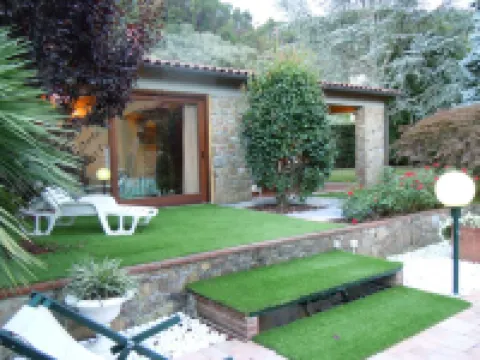 House with large veranda, garden and swimming pool