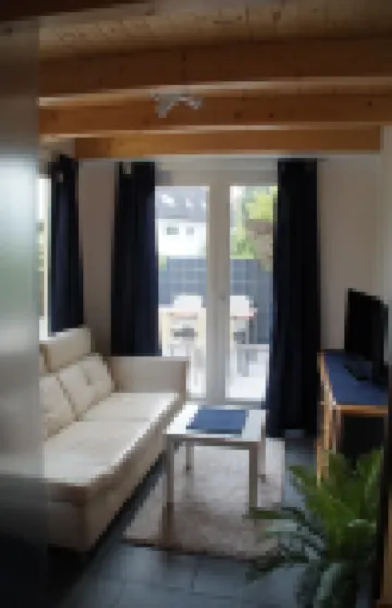 Living on three levels - 2.5 room semi-detached house with terrace and private access