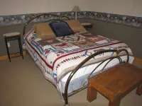 Comfortable basement apartment on Little Sheep Creek at foot of Lima Peaks