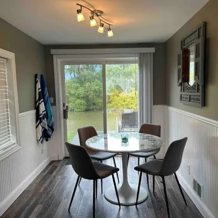Cozy Black River Cottage with Private Dock and Boat Hoist-Sleeps 6