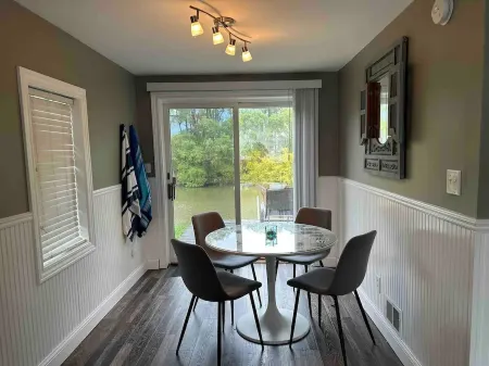 Cozy Black River Cottage with Private Dock and Boat Hoist-Sleeps 6