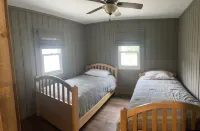 Minutes to town or very peaceful woods retreat! Close to trails and golf.