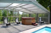 UNIQUE! 40 Pvt. Ac. Fireplace, Grill, Enclosed Heated Pool & Hot Tub