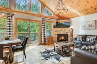 Only Minutes to Attractions with Indoor Sauna, Hot Tub, Games, and Fireplace!