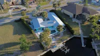 Remodeled Home on a Deep Canal with Amazing Water Views Just Blocks from Town
