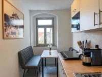 Central apartment for 4 people with kitchen, WiFi & private parking space