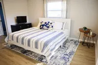 Island Song- Heated saltwater pool, putt putt, games, Anna Maria Island and IMG Hotels near Dancing Crane Gallery LLC