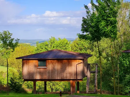 Hotel Waldquelle - Baumhaushotel Aerzen Отели в г. Хамельн-Пирмонт