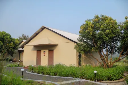 Tiki Farms Отели в г. Каламболи Тарф Уореди