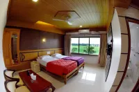 Hotel Sharada International Hotels near Sri Chamundeshwari Ammanavara Devasthana, Karamballi