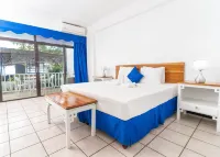 Sand and Tan Beach Hotel