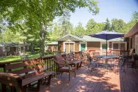 “Pet-Friendly Geneva Lake Cabins – Fire Pit, Private Units, Walk to Lakefront”