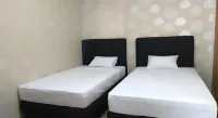 Coconut Hotel فنادق في Semen