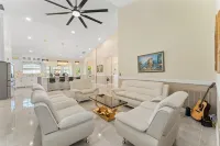 Luxurious 5-Bedroom Retreat: Gold Accents, Modern Amenities, & Fun