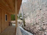 Cozy River front cabin w/Private natural spring. Pet Friendly! Hotels in Powell County