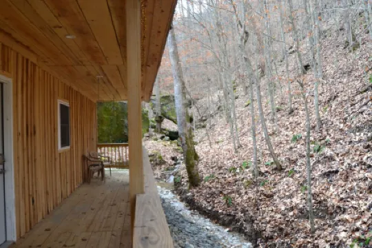 Cozy River front cabin w/Private natural spring. Pet Friendly!