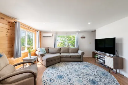 Stunning Lakefront Retreat with Hot Tub and Deck - Exquisite Getaway