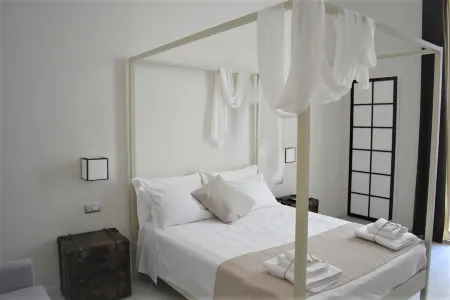 Gatto Bianco Duchessa Отели рядом с достопримечательностью «Pane e Pomodoro Beach»