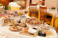 Hotel Tiempo - Desayuno