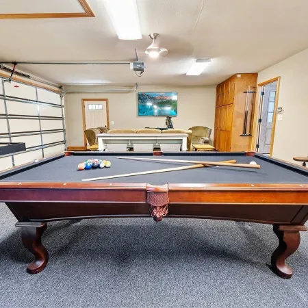 Kim's Cove Motorcycle-Friendly Cabin Features Game Room by RedAwning