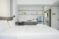 Warm and Simply Studio Room at Urbantown Serpong Apartment