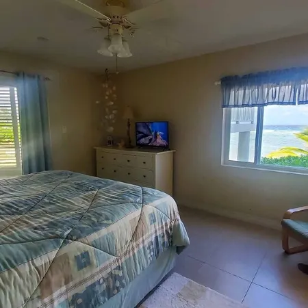 Steps to Sand & Sea - Oceanfront Condo with Pool in Quiet Cayman Kai/Rum Point