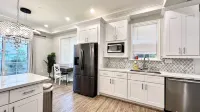 Upscale Condo NEW 2 BR ENSuite 2.5 Bath Attached Garage , full amenities