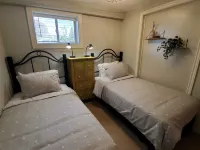 Cozy & Bright 3 Bedroom, 2 Bath Basement Suite Hotels near Save-On-Foods