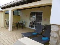 Bungalow with apartment in a quiet location and large pool