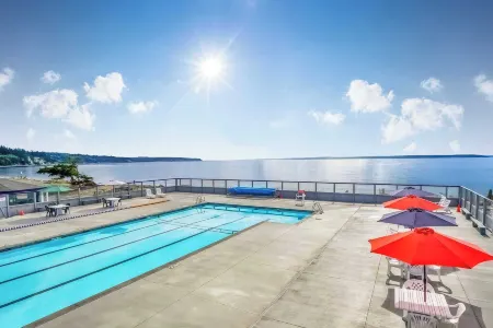 Deck Views Fire Pit Pool 3 Mins to Beach Madrona Tree Retreat by AvantStay
