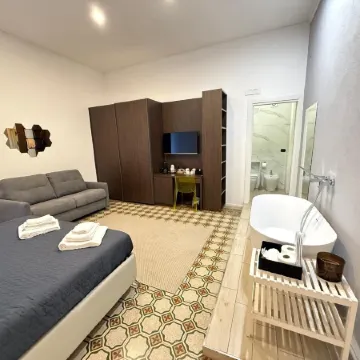 La Piazza Suite Отели рядом с достопримечательностью «Бассейн «Скандоне»»