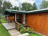 Welcome to Shangri-Lodge Your 2 cabin retreat on a family friendly lake.