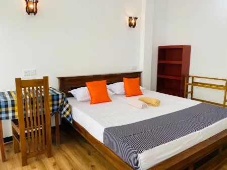 Spacious apartment with 13 bedrooms with bathrooms.Fiber wifi also have Отели в г. Камберюгамува