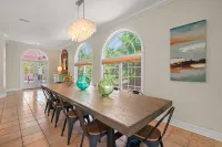Waterfront Pink House with Private Dock & Pool - 4-Star
